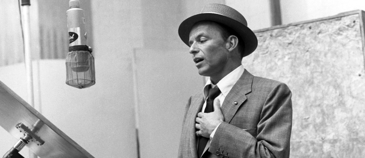 Frank Sinatra in front of microphone